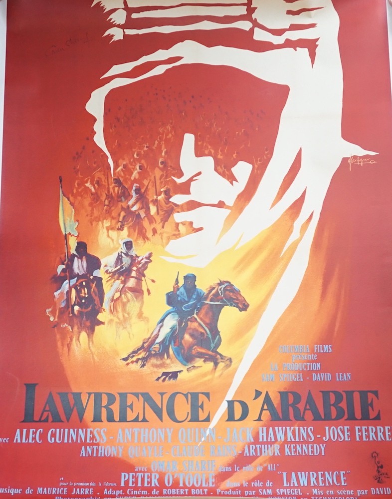 A French poster for Lawrence Of Arabia / Lawrence D'Arabie, Columbia Pictures, 1962, style A, art by Georges Kerfyser, signed by Omar Sharif, 165 x 124cm, linen backed, unframed.